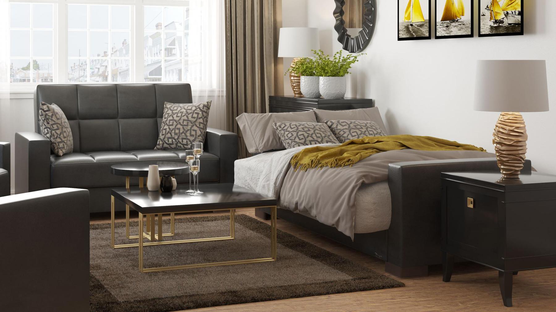 Modern design, Black , Artificial Leather  upholstered convertible sleeper Loveseat with underseat storage from Voyage Track by Ottomanson in living room lifestyle setting converted to sleeper. This Loveseat measures 67 inches width by 36 inches depth by 41 inches height.