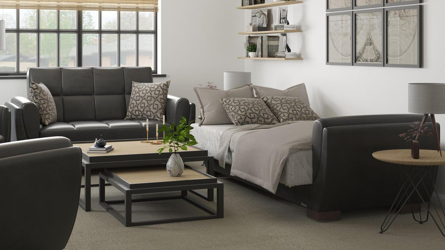 Modern design, Black , Artificial Leather upholstered convertible sleeper Loveseat with underseat storage from Voyage Shelter by Ottomanson in living room lifestyle setting converted to sleeper. This Loveseat measures 71 inches width by 36 inches depth by 41 inches height.