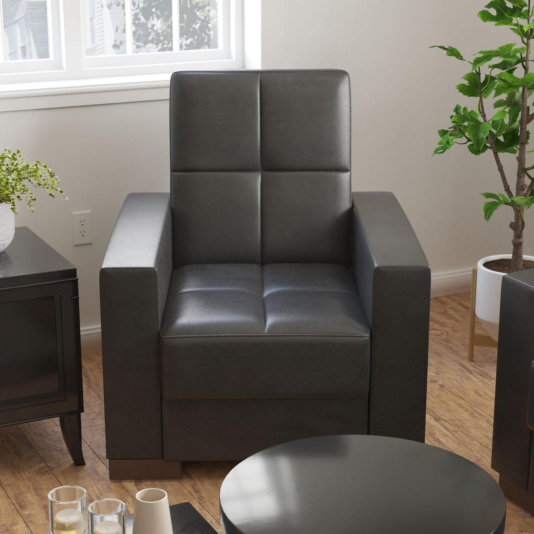 Modern design, Black , Artificial Leather upholstered convertible Armchair with underseat storage from Voyage Track by Ottomanson in living room lifestyle setting by itself. This Armchair measures 38 inches width by 36 inches depth by 41 inches height.