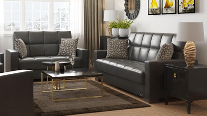 Modern design, Black , Artificial Leather upholstered convertible sleeper Loveseat with underseat storage from Voyage Track by Ottomanson in living room lifestyle setting with another piece of furniture. This Loveseat measures 67 inches width by 36 inches depth by 41 inches height.