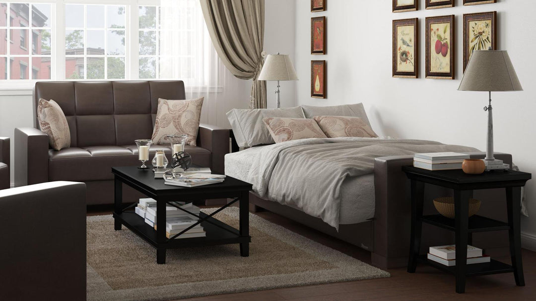 Modern design, Dark Brown , Artificial Leather  upholstered convertible sleeper Loveseat with underseat storage from Voyage Track by Ottomanson in living room lifestyle setting converted to sleeper. This Loveseat measures 67 inches width by 36 inches depth by 41 inches height.