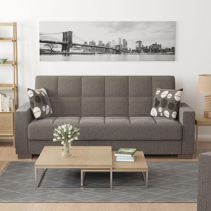 Modern design, Dark Slate Gray , Chenille upholstered convertible sleeper Sofabed with underseat storage from Voyage Track by Ottomanson in living room lifestyle setting by itself. This Sofabed measures 90 inches width by 36 inches depth by 41 inches height.