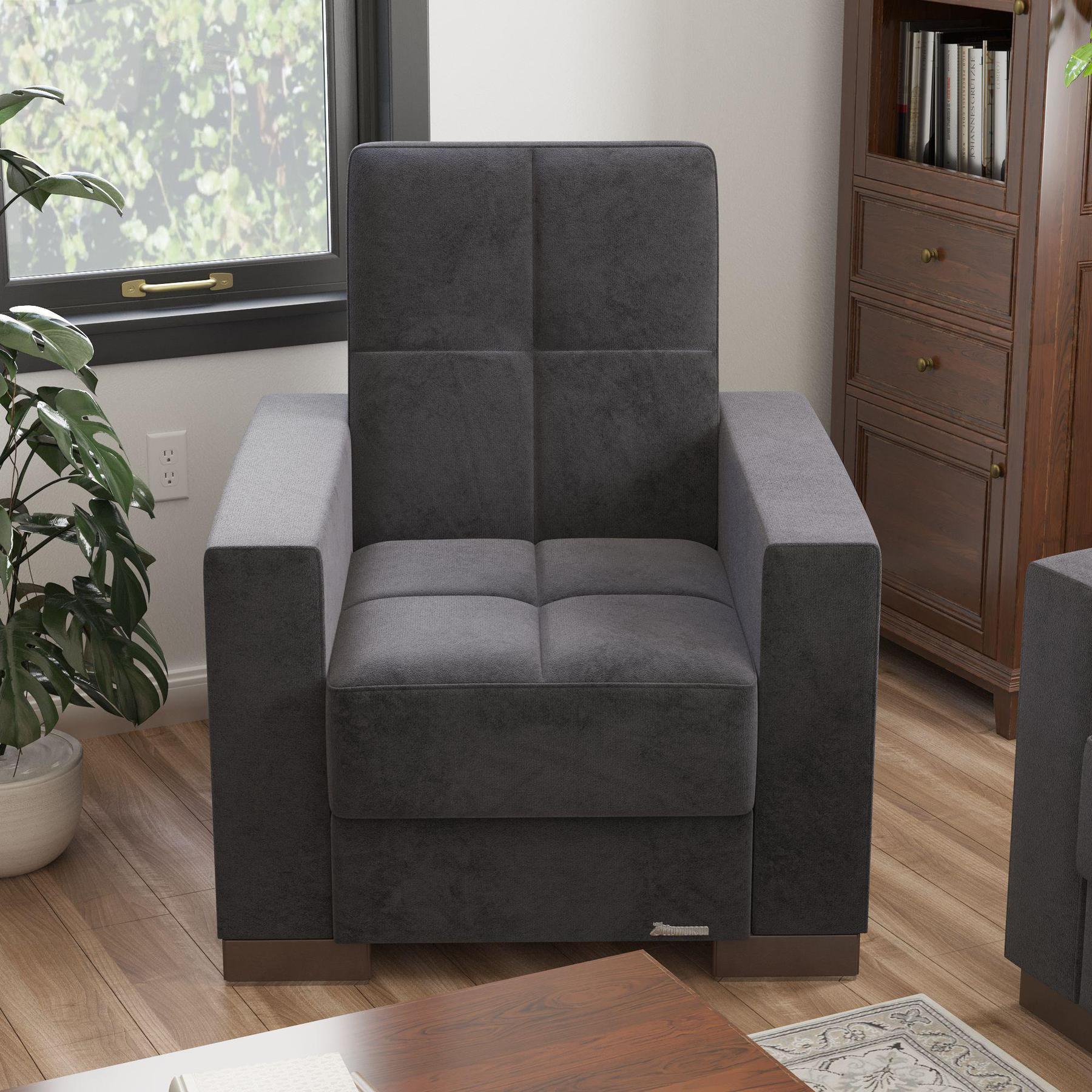 Modern design, Black , Microfiber upholstered convertible Armchair with underseat storage from Voyage Track by Ottomanson in living room lifestyle setting by itself. This Armchair measures 38 inches width by 36 inches depth by 41 inches height.