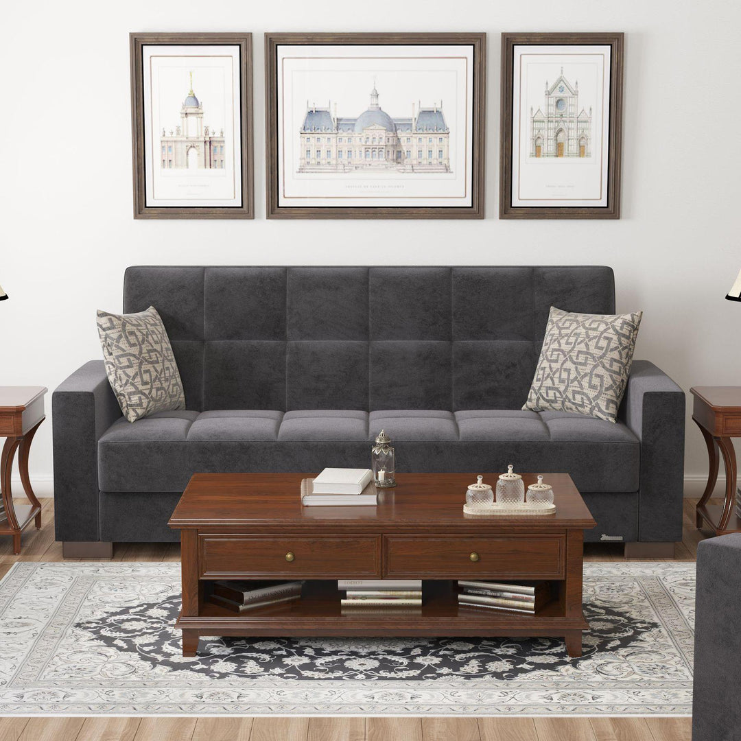 Modern design, Black , Microfiber upholstered convertible sleeper Sofabed with underseat storage from Voyage Track by Ottomanson in living room lifestyle setting by itself. This Sofabed measures 90 inches width by 36 inches depth by 41 inches height.
