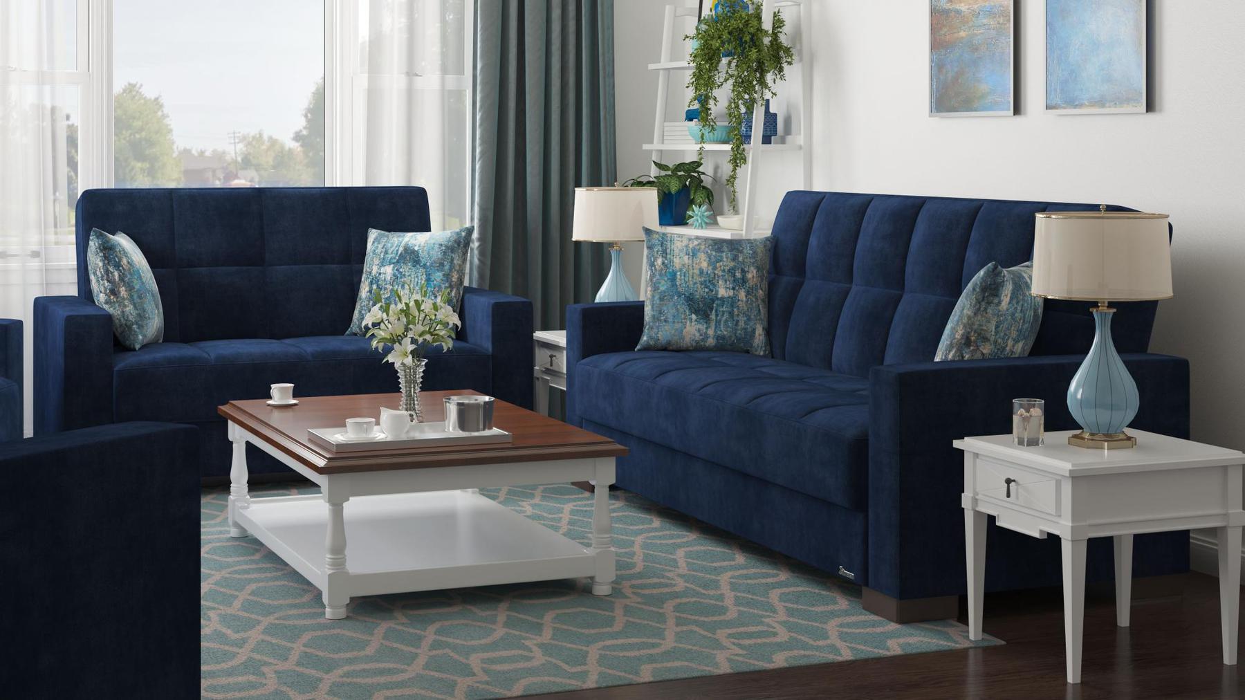Modern design, True Blue , Microfiber upholstered convertible sleeper Loveseat with underseat storage from Voyage Track by Ottomanson in living room lifestyle setting with another piece of furniture. This Loveseat measures 67 inches width by 36 inches depth by 41 inches height.
