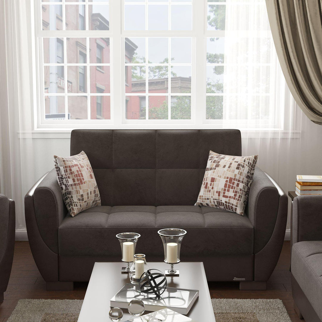 Modern design, Friar Brown, Dark Brown , Microfiber, Artificial Leather upholstered convertible sleeper Loveseat with underseat storage from Voyage Shelter by Ottomanson in living room lifestyle setting by itself. This Loveseat measures 71 inches width by 36 inches depth by 41 inches height.