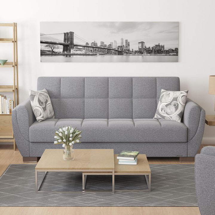 Modern design, Salt and Pepper Gray , Chenille upholstered convertible sleeper Sofabed with underseat storage from Voyage Shelter by Ottomanson in living room lifestyle setting by itself. This Sofabed measures 94 inches width by 36 inches depth by 41 inches height.