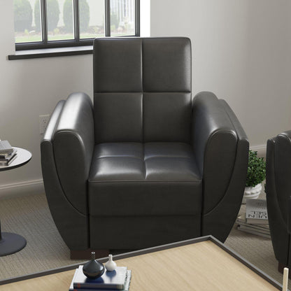 Modern design, Black , Artificial Leather upholstered convertible Armchair with underseat storage from Voyage Shelter by Ottomanson in living room lifestyle setting by itself. This Armchair measures 42 inches width by 36 inches depth by 41 inches height.