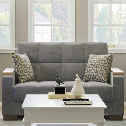 Modern design, Pewter Gray , Microfiber upholstered convertible sleeper Loveseat with underseat storage from Voyage Luxe by Ottomanson in living room lifestyle setting by itself. This Loveseat measures 67 inches width by 36 inches depth by 41 inches height.