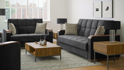 Modern design, Black , Microfiber upholstered convertible sleeper Loveseat with underseat storage from Voyage Luxe by Ottomanson in living room lifestyle setting with another piece of furniture. This Loveseat measures 67 inches width by 36 inches depth by 41 inches height.