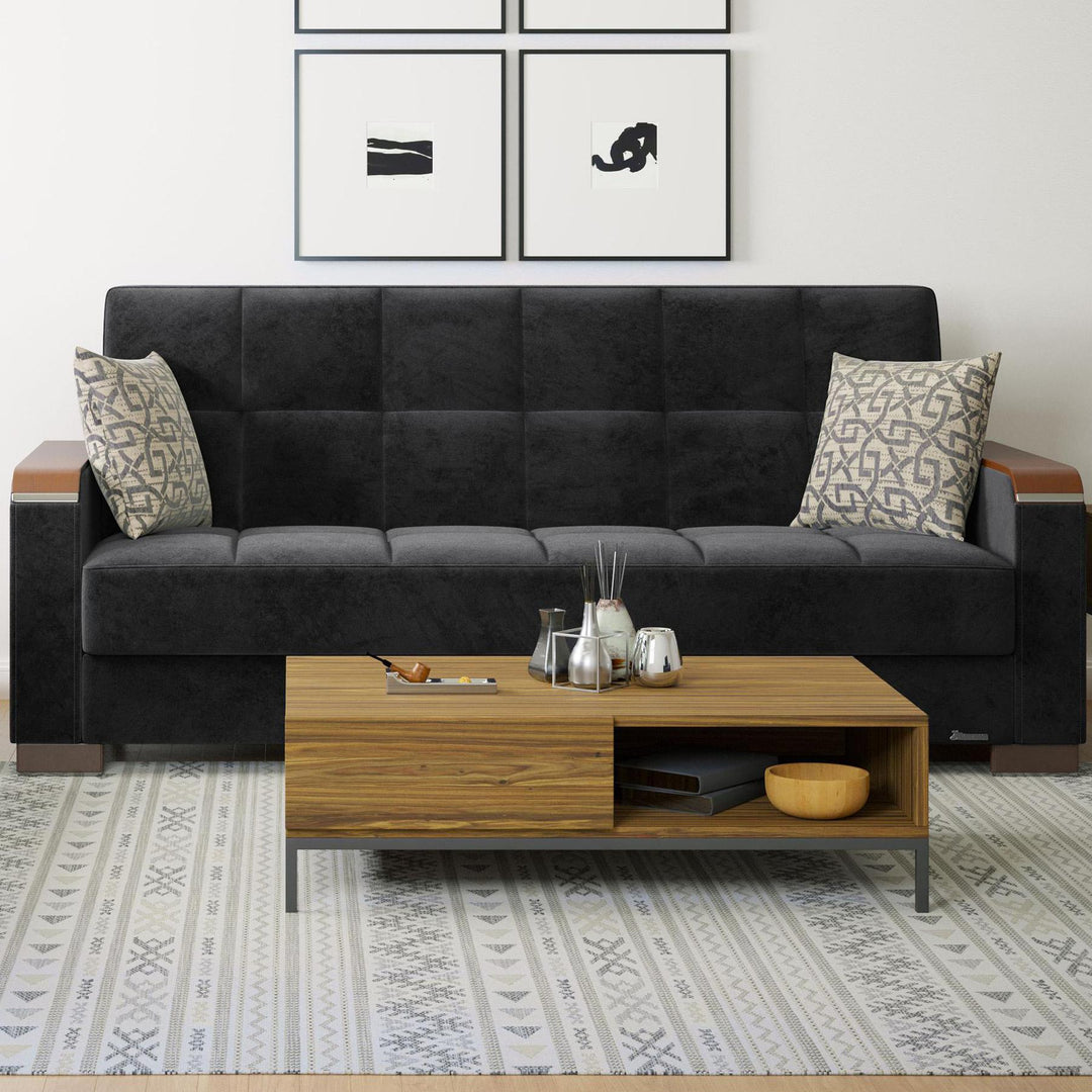 Modern design, Black , Microfiber upholstered convertible sleeper Sofabed with underseat storage from Voyage Luxe by Ottomanson in living room lifestyle setting by itself. This Sofabed measures 90 inches width by 36 inches depth by 41 inches height.