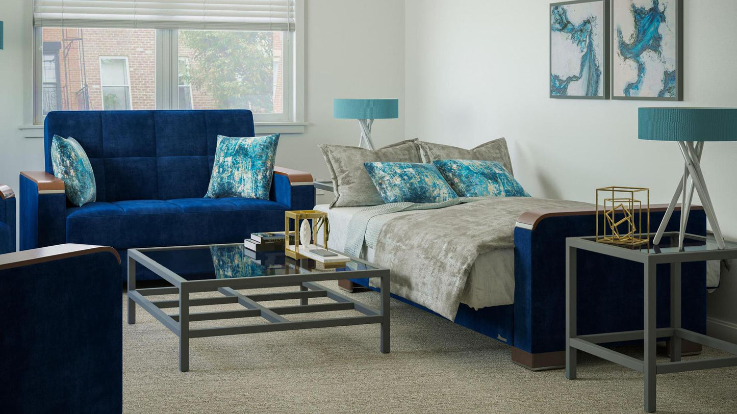 Modern design, True Blue , Microfiber  upholstered convertible sleeper Loveseat with underseat storage from Voyage Luxe by Ottomanson in living room lifestyle setting converted to sleeper. This Loveseat measures 67 inches width by 36 inches depth by 41 inches height.