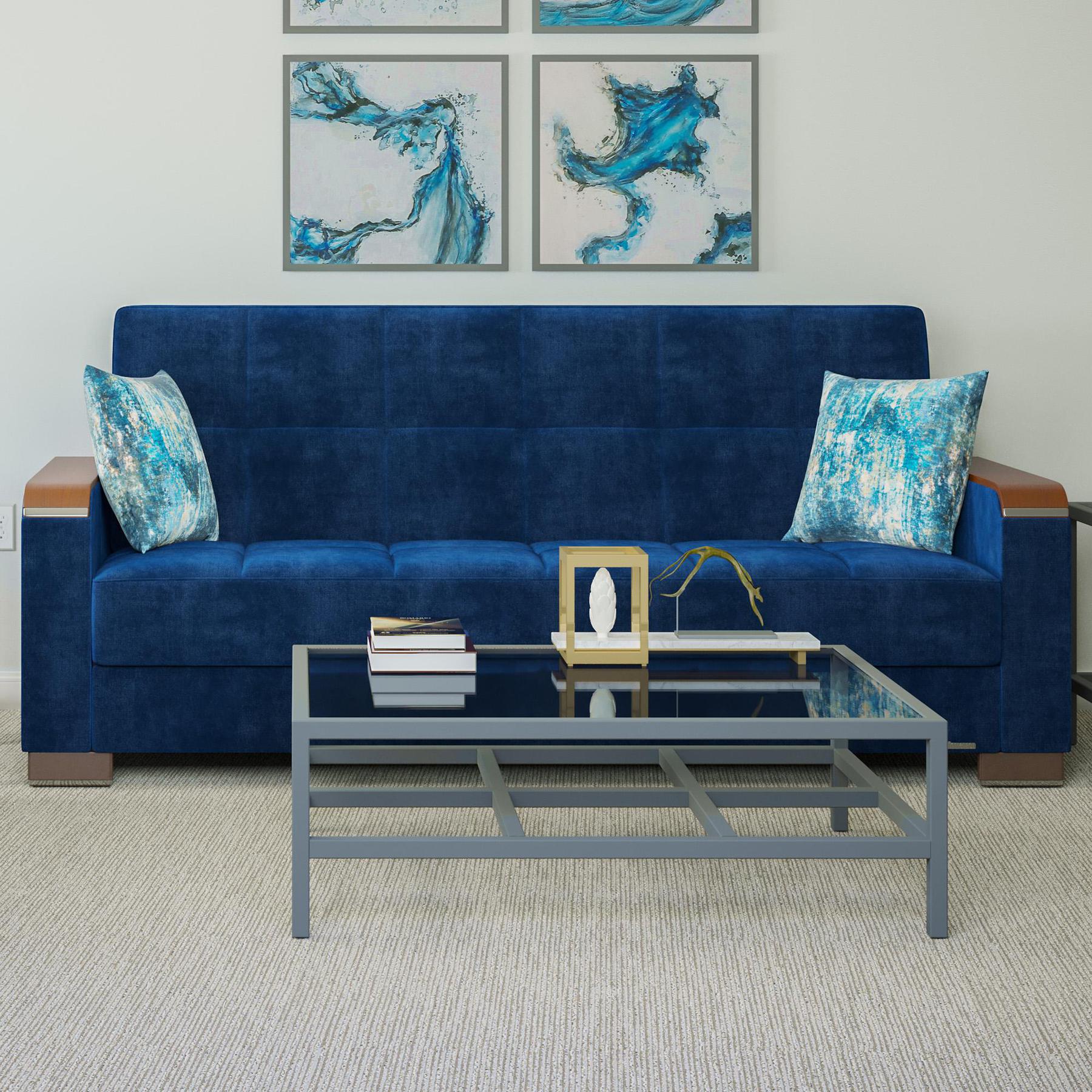 Modern design, True Blue , Microfiber upholstered convertible sleeper Sofabed with underseat storage from Voyage Luxe by Ottomanson in living room lifestyle setting by itself. This Sofabed measures 90 inches width by 36 inches depth by 41 inches height.