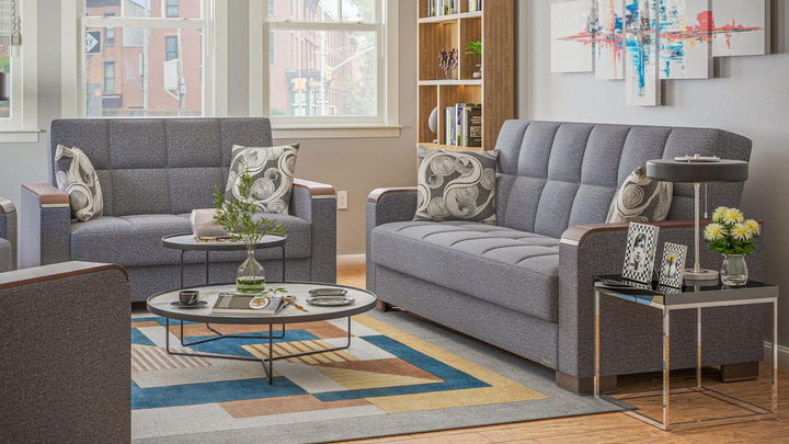 Modern design, Salt and Pepper Gray , Chenille upholstered convertible sleeper Loveseat with underseat storage from Voyage Luxe by Ottomanson in living room lifestyle setting with another piece of furniture. This Loveseat measures 67 inches width by 36 inches depth by 41 inches height.