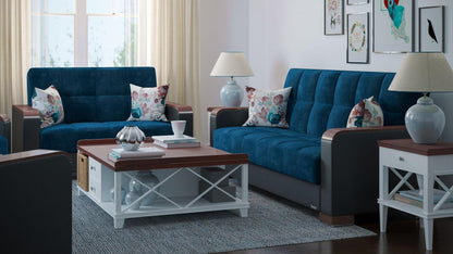 Modern design, Snorkel Blue, Black , Microfiber, Artificial Leather upholstered convertible sleeper Loveseat with underseat storage from Voyage Luxe by Ottomanson in living room lifestyle setting with another piece of furniture. This Loveseat measures 67 inches width by 36 inches depth by 41 inches height.