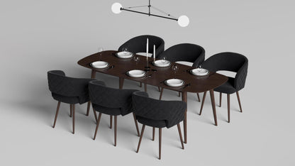 Napoli Barrel Back , Mid-Century Modern design, upholstered dining chair in Black with Brown Wood legs in a dining room for a large gathering setup.