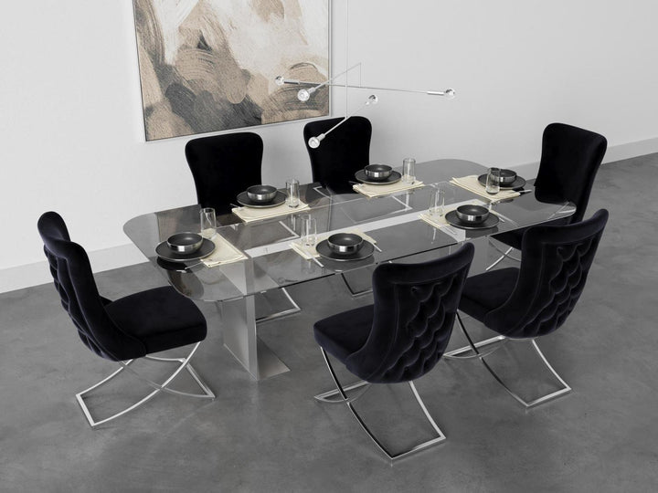 Sultan Wing Back , Modern design, upholstered dining chair in Black with Silver Metal legs in a dining room for a large gathering setup.