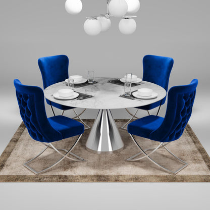 Sultan Collection Wing Back, Modern design, upholstered dining chair in Imperial Blue with Silver Metal legs in a dining room with set of four chairs around a round table.