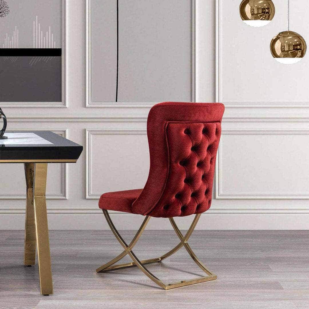 Sultan , design, upholstered dining chair in with legs in a dining room with set of four chairs around a round table.