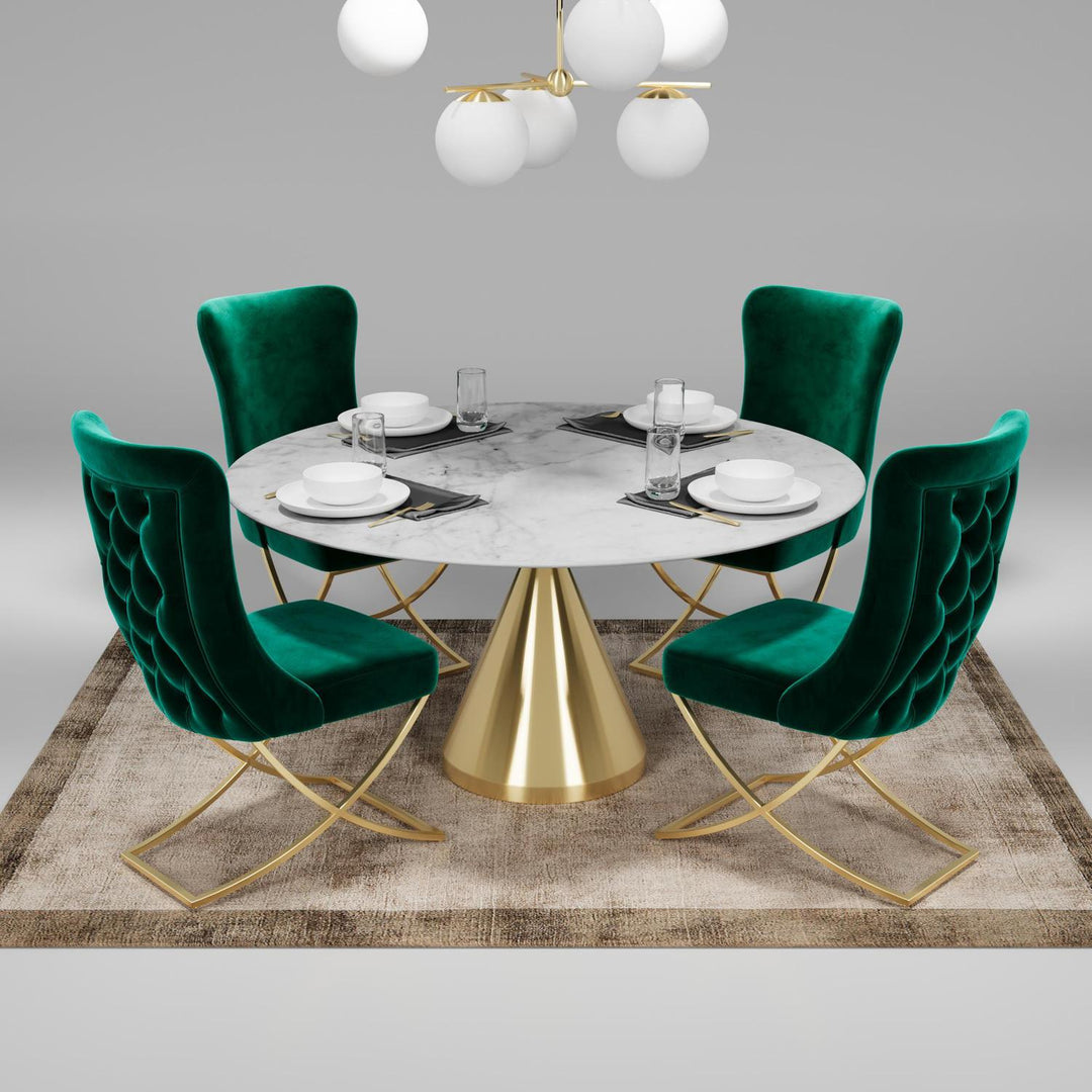 Sultan Wing Back , Modern design, upholstered dining chair in Emerald Green with Gold Metal legs in a dining room with set of four chairs around a round table.